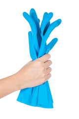 Female hand holding blue glove isolated on white background