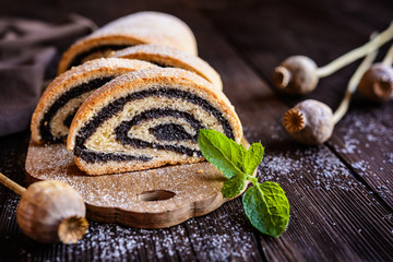 Poppy seed strudel sprinkled with powdered sugar