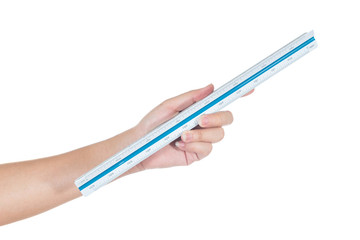 Female hand holding a white and blue ruler isolated on white background