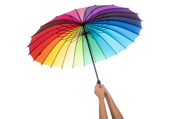 Female hand holding colorful umbrella isolated on white background