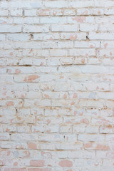 Fototapeta premium Background of a common brick wall of white color