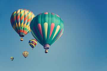 Fototapeta na wymiar Multi colored hot air balloons