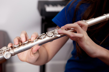 Close up of a flautist playing a flute. © Rusty