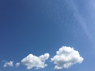 Isolated white clouds on blue sky. Set of isolated clouds over blue background. Design elements....