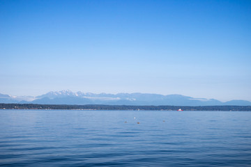 Fototapeta na wymiar View of The Olympic Mountains accross Puget Sound