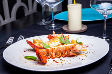 Lobster tail in maple-truffle sauce with lemon and basil