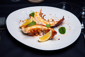 Lobster tail in maple-truffle sauce with lemon and basil