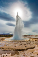 The Great Geysir erupting in spring, Iceland