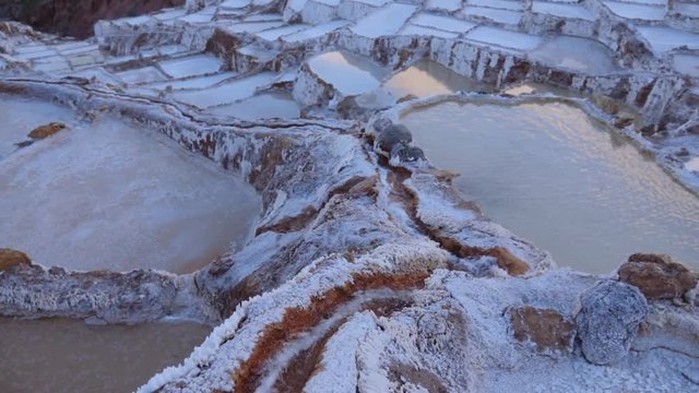 Natural spring inside the salt ponds of Maras, Peru.
