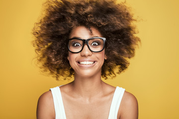 African american girl wearing eyeglasses,smiling.