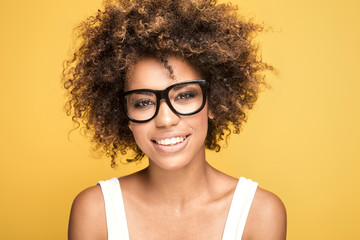 African american girl wearing eyeglasses,smiling.
