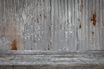 Wooden floor with old metal sheet roof texture. Pattern of old metal sheet. Metal sheet texture. Rusty metal sheet texture.