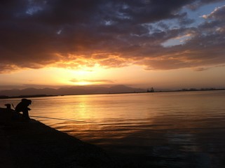 Pescatore, attesa al tramonto