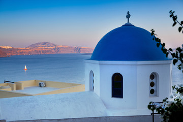 Fototapeta na wymiar Famous blue domes of the churches on Santorini Island. Santorini Greece