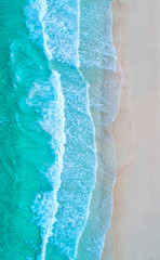 Sea aerial view,Top view,amazing nature background.The color of the water and beautifully bright.Azure beach with rocky mountains and clear water of Thailand ocean at sunny day.