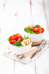 The baked chicken and vegetables salad. Healthy food. Diet. Selective focus. Copy space