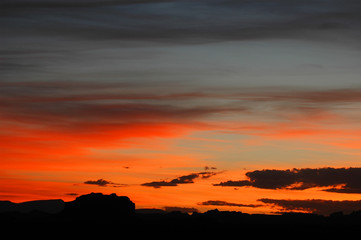 sunset dramatic sky and mountain silhouette