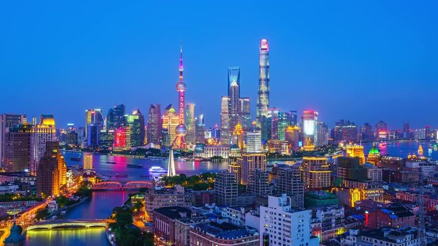 Time lapse of Shanghai skyline and Huangpu River viewed from skyscraper.