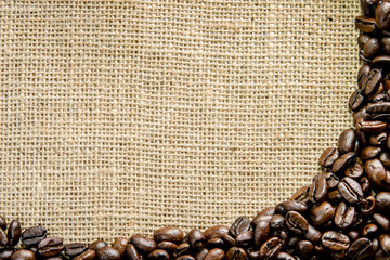 Roasted coffee beans on canvas floor