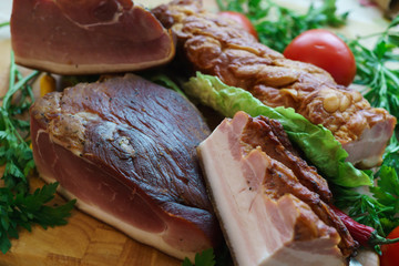 Salted traditional way of pieces of pork, along with chili and vegetables.
