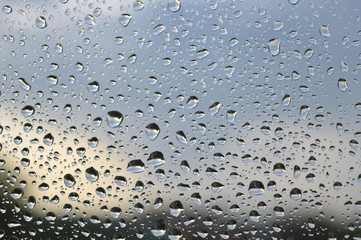 Drops of rain on the window, rainy day