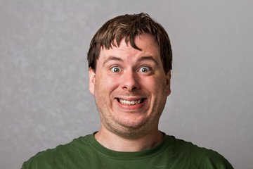 guy making a weird smile
