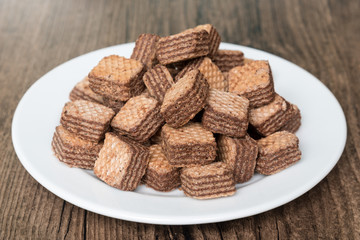 Chocolate Wafers on white plate.