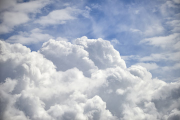 Dramatic cumulus clouds with high level cirrocumulus clouds for use as background - obrazy, fototapety, plakaty