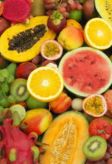 Many fresh fruits as food background