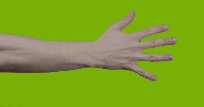 slow motion of adult young man hand counting one to five over green screen