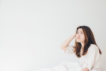 Portrait of asian women looking at white background.