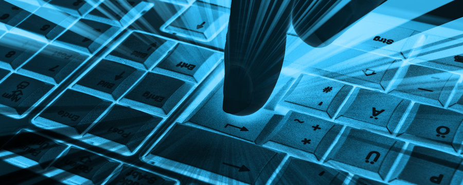 Tastatur mit Hand und Strahlenhintergrund