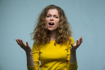 beauty woman in yellow shirt emotions