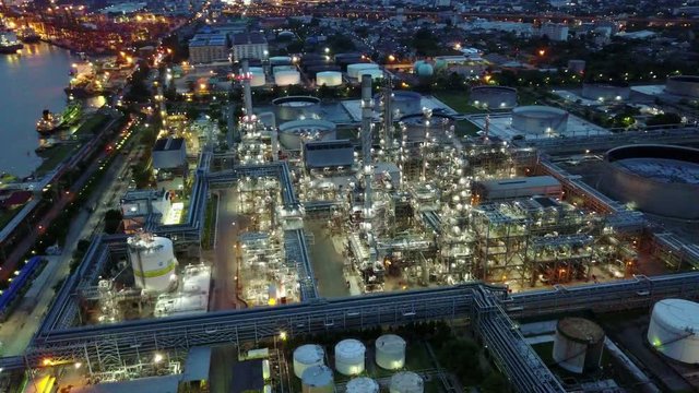 4K Night aerial Shot from oil tanks in a refinery