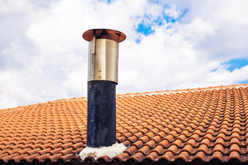 Chimney stack and roofing on the new building