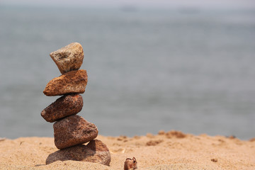 Stones balance on sea beach