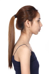 Naklejka premium Asian Woman before make up and hair do style dresser. no retouch, fresh face with acne, skin moles, wart then good base and foundation cosmetic, rear back side
