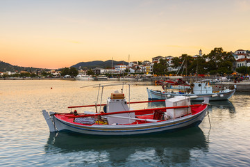 Fishing boats in the harbour of Skopelos town, Greece.
