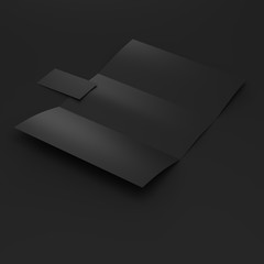 black folded paper and visit card