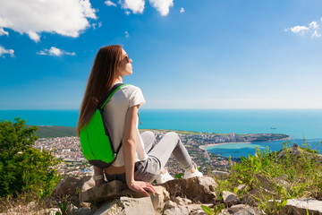 Mountain sea summer. Back. Jeans and shirt
