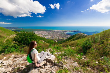 Naklejka premium Mountain sea summer. Back. Jeans and shirt