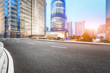 Fototapeta na wymiar Asphalt road in Lujiazui commercial and financial center,Shanghai,China