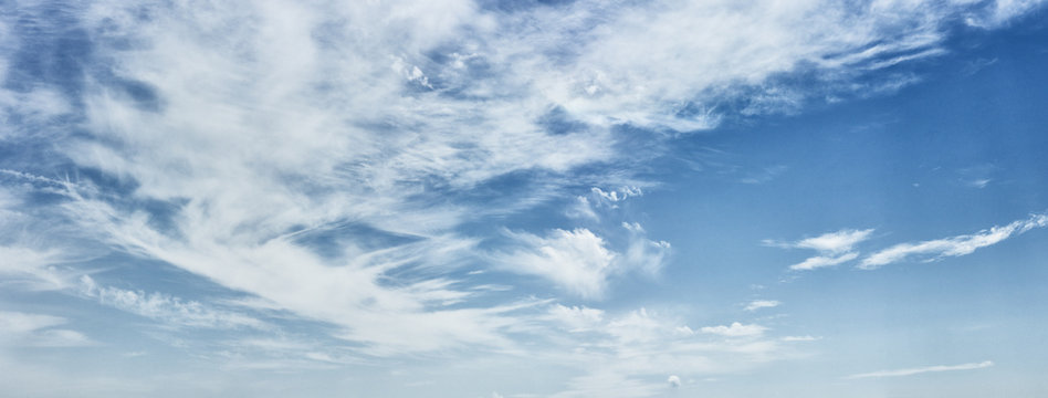 Cirrus Clouds On A Deep Blue Sky