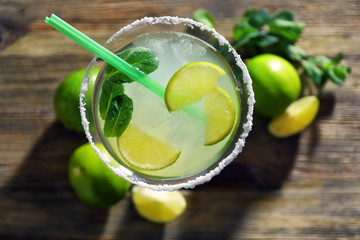 Delicious margarita cocktail on table, closeup