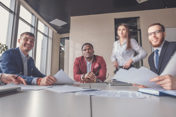 startup business, young creative people group entering meeting room, modern office interior and...