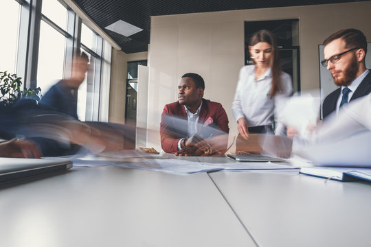 Businesspeople Working In Office, One Man Think, Pronounced Motion Blur