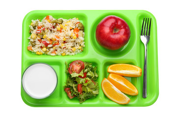 Serving tray with delicious food on white background. Concept of school lunch
