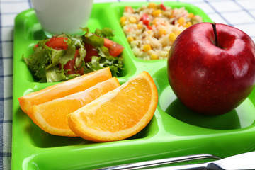 Serving tray with delicious food, closeup. Concept of school lunch