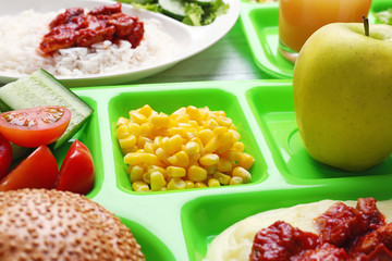 Serving tray with delicious food, closeup. Concept of school lunch