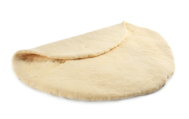 Rolled raw dough on white background